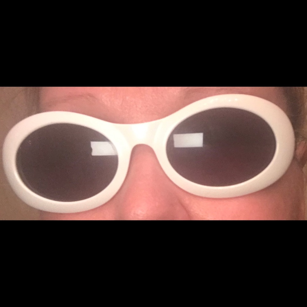 Gucci white frame black glasses shades.